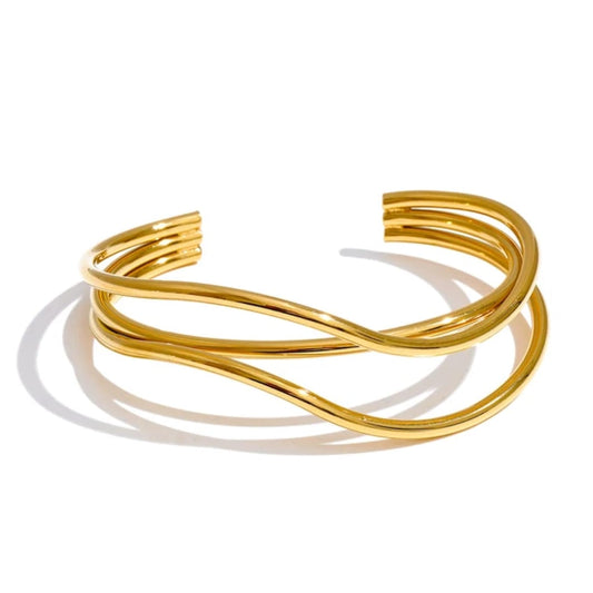 Gold bracelet on a white background
